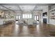 The spacious lounge features a fireplace, elegant furniture, and abundant natural light at 2536 Maricopa Blvd, Whitestown, IN 46075