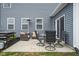 Outdoor patio with a dining table, grill, and comfortable seating, perfect for outdoor entertaining and relaxation at 2536 Maricopa Blvd, Whitestown, IN 46075