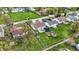 Aerial view of fenced backyard featuring a trampoline, storage shed, and a well-maintained lawn at 3110 S Temple Ave, Indianapolis, IN 46237