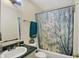 Cozy bathroom with a shower and a vanity with a green countertop, providing functionality and style at 3110 S Temple Ave, Indianapolis, IN 46237