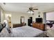 Bedroom with dresser, and access to the living area and bathroom at 3110 S Temple Ave, Indianapolis, IN 46237