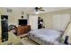 Bedroom featuring dresser and ceiling fan at 3110 S Temple Ave, Indianapolis, IN 46237