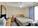 Neutral bedroom featuring ceiling fan and a full sized bed at 3110 S Temple Ave, Indianapolis, IN 46237