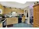 Cozy kitchen featuring ample cabinet space and a black dishwasher at 3110 S Temple Ave, Indianapolis, IN 46237