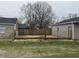Backyard enclosed by a wood fence and some grass at 3302 S Rybolt Ave, Indianapolis, IN 46221