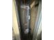 Hot water tank located in utility room at 3302 S Rybolt Ave, Indianapolis, IN 46221