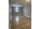 Spacious living room featuring tan tiling at 3302 S Rybolt Ave, Indianapolis, IN 46221