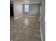 Spacious living room featuring tan tiling at 3302 S Rybolt Ave, Indianapolis, IN 46221