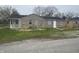 View of the back of home with rear porch at 3302 S Rybolt Ave, Indianapolis, IN 46221
