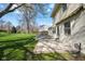 Expansive backyard with a concrete patio and lush green lawn, perfect for outdoor entertaining at 3738 Barrington Dr, Carmel, IN 46033