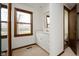 Well-lit bathroom featuring a new vanity, contemporary mirror, and ample natural light at 3738 Barrington Dr, Carmel, IN 46033