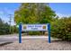 Sign for Gray Road Park with lush greenery and a clear blue sky creating an inviting outdoor space at 3738 Barrington Dr, Carmel, IN 46033