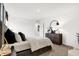Bright bedroom boasts a modern aesthetic, with an ensuite bathroom and ample natural light at 3916 Andean Ct, Bargersville, IN 46106