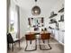 Stylish home office with a globe, built-in shelves, and modern decor provides a functional workspace at 3916 Andean Ct, Bargersville, IN 46106