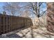 Fenced backyard with patio and gravel, offering privacy and an outdoor retreat at 456 E Arch St, Indianapolis, IN 46202