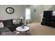 Comfortable living room with neutral walls, plush carpet, and plenty of space for relaxation at 530 Farnham Dr, Westfield, IN 46074