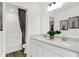 Modern bathroom with double vanity, quartz countertop, stylish mirrors, and a shower-tub combo at 5311 Pelion Pl, McCordsville, IN 46055