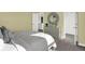Bright bedroom showcasing a stylish dresser and views into the hall and walk-in closet at 5311 Pelion Pl, McCordsville, IN 46055