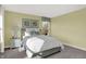 Comfortable bedroom with neutral tones, complemented by soft lighting and soothing artwork at 5311 Pelion Pl, McCordsville, IN 46055