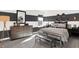 Modern bedroom with black and white striped walls, sporty decor, and stylish furnishings at 5311 Pelion Pl, McCordsville, IN 46055