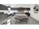 Stylish bedroom featuring black and white striped walls, sporty decor, and a metal framed bed at 5311 Pelion Pl, McCordsville, IN 46055