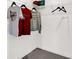 Bright walk-in closet with wire shelving and hanging clothes for ample storage space at 5311 Pelion Pl, McCordsville, IN 46055