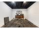 Versatile unfinished basement area with decorative furniture and concrete floor, ready for customization to fit any need at 5348 Ashby Ct, Greenwood, IN 46143