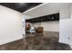 View of the finished basement with concrete floors and access to different living spaces at 5348 Ashby Ct, Greenwood, IN 46143