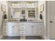 Bathroom featuring double vanity sinks, granite countertop, framed mirrors, and great lighting at 5348 Ashby Ct, Greenwood, IN 46143