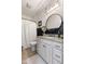 Modern bathroom featuring granite counters, modern fixtures, and decorative mirror at 5348 Ashby Ct, Greenwood, IN 46143
