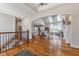 Open-concept living room showcasing hardwood floors, skylights, a fireplace, and an inviting layout at 5348 Ashby Ct, Greenwood, IN 46143