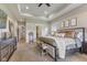 Cozy bedroom with a tray ceiling has a walk-in closet and a bathroom with a shower at 5348 Ashby Ct, Greenwood, IN 46143