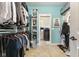 Well-organized walk-in closet with built-in shelving and rods provides ample storage space at 5348 Ashby Ct, Greenwood, IN 46143