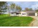 Charming one-story home with a well-manicured lawn and attached garage, perfect for comfortable living at 575 Everling Dr, Morgantown, IN 46160