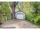 One car detached garage with a gravel driveway being sold as is at 5817 Beechwood Ave, Indianapolis, IN 46219