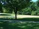 A volleyball court and picnic tables offer residents an opportunity to enjoy the beautiful outdoors at 5817 Beechwood Ave, Indianapolis, IN 46219