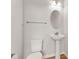 Powder room featuring a pedestal sink, oval mirror, and neutral paint at 5964 Lomita Ave, Plainfield, IN 46168