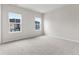 Spacious bedroom featuring plush carpeting, neutral walls, and natural light at 5964 Lomita Ave, Plainfield, IN 46168