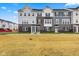 Charming townhomes boast stone accents, inviting entryways, and well-maintained landscaping at 5964 Lomita Ave, Plainfield, IN 46168