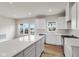 Spacious kitchen with a large island, white cabinets, and stainless steel appliances at 5964 Lomita Ave, Plainfield, IN 46168