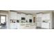 Well-equipped kitchen with sleek appliances, a center island, and ample cabinet space, perfect for cooking and entertaining at 6718 Thresher Pass, McCordsville, IN 46055
