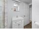 Well-lit bathroom features a modern vanity, neutral walls and wood flooring at 6827 S 500 W, Trafalgar, IN 46181