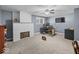 Bonus room featuring a whitewashed fireplace and carpet flooring at 6827 S 500 W, Trafalgar, IN 46181