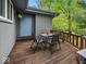 Relaxing outdoor deck with seating, perfect for enjoying the surrounding nature and fresh air at 6827 S 500 W, Trafalgar, IN 46181