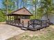 Outdoor gazebo featuring a hot tub and bar, ideal for gatherings and outdoor entertainment at 6827 S 500 W, Trafalgar, IN 46181