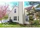 Expansive backyard featuring mature trees, lush greenery, and a peaceful outdoor space at 701 Danver Ln, Beech Grove, IN 46107
