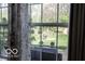 Backyard as seen through window at 701 Danver Ln, Beech Grove, IN 46107