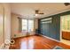Bedroom with hardwood flooring, ceiling fan, accent wall and natural light at 701 Danver Ln, Beech Grove, IN 46107