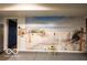 Charming garage with a beach mural, adding a touch of coastal charm to your home at 701 Danver Ln, Beech Grove, IN 46107