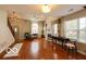 Inviting living room with hardwood floors, a fireplace, and comfortable seating, creating a cozy atmosphere at 701 Danver Ln, Beech Grove, IN 46107